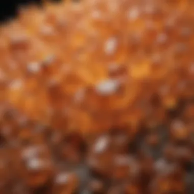 Diverse Collection of Light Orange Crystals A collection of various light orange crystals arranged aesthetically