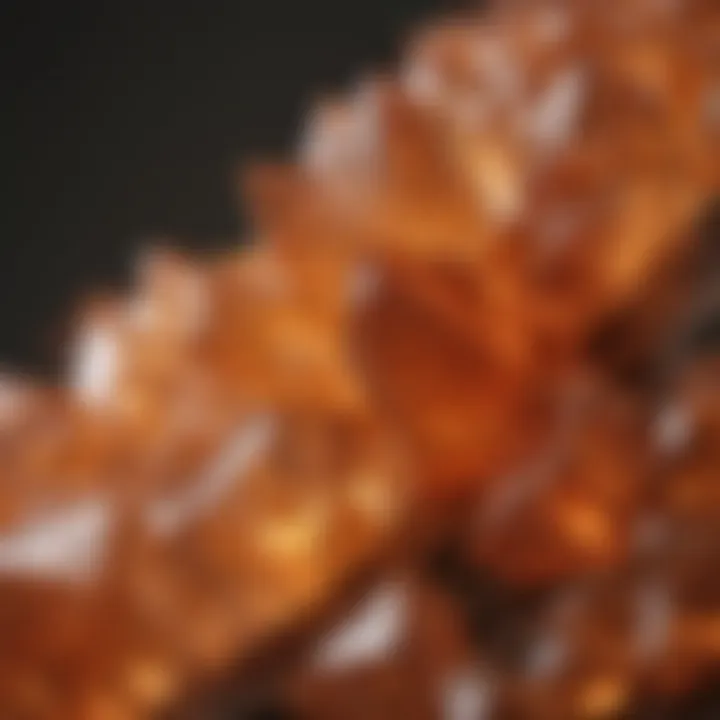 Natural light orange crystals displayed against a textured background