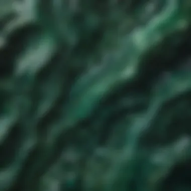 Intricate Patterns of Malachite Close-up view of malachite showcasing its rich green color and banded patterns