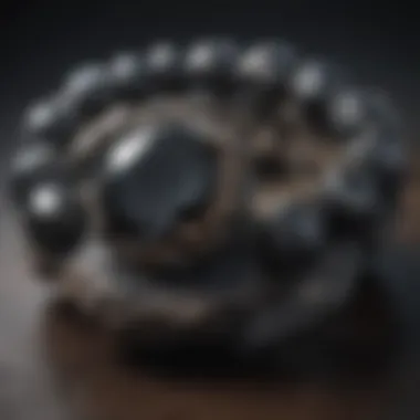 A beautifully crafted piece of jewelry featuring black and grey stones