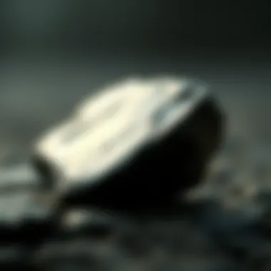 Glossy Black Obsidian Black obsidian reflecting light with a smooth finish