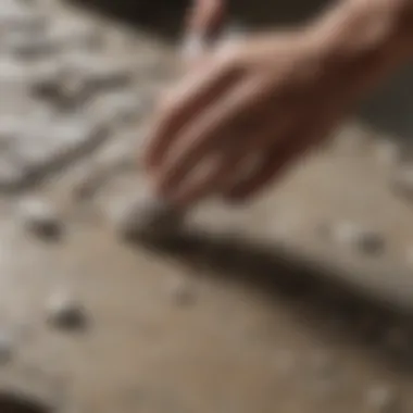 Close-up of a stone surface being treated with a bonding agent