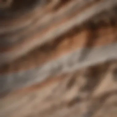 A close-up view of layered sedimentary rocks revealing stratification